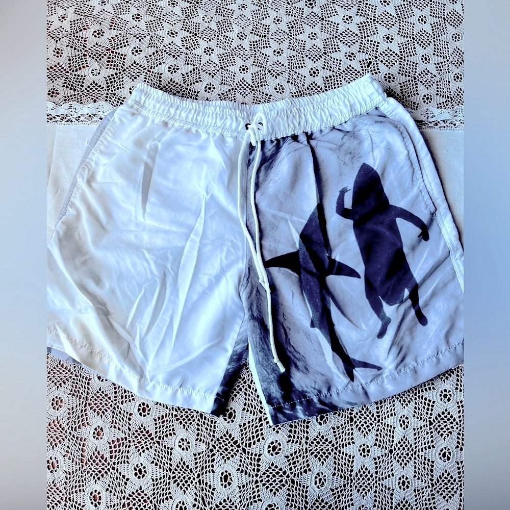 Shark in the water swim trunks 🦈